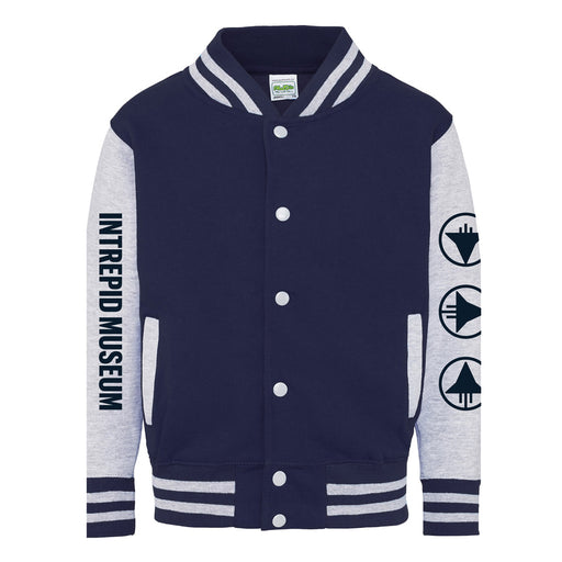 The Intrepid Museum Icons Youth Bomber Jacket features a navy and gray design with “INTREPID MUSEUM” in blue on the left sleeve and three circular aviation history icons on the right sleeve. Classic white stripes accent the collar, cuffs, and hem for an iconic Intrepid Museum bomber jacket style.