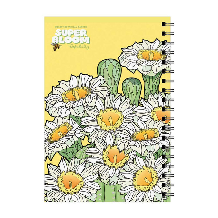 Desert Botanical Garden Superbloom Spiral Notebook with a yellow cover featuring illustrations of white cactus flowers.