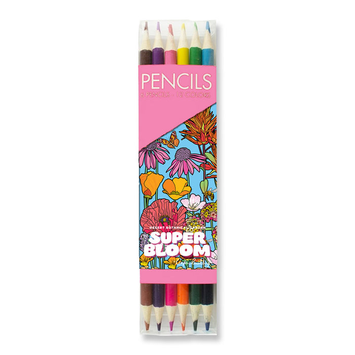 A set of six dual-ended Desert Botanical Garden Superbloom Pencil Set colored pencils in a clear plastic sleeve featuring a pink and blue floral illustration with the text Pencils, 6 Pencils - 12 Colors.