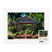 A matted Fort Worth Botanical Garden Trellis Mounted Print showing a stone walkway in a garden, with a small rectangular label in the bottom right corner featuring the garden’s name, address, and a barcode.