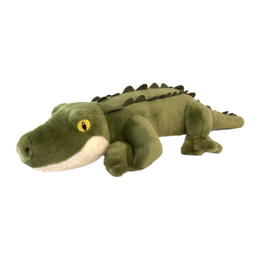 The Eco Green Alligator Plush is a green plush toy featuring yellow eyes, a row of dark spikes along its back, and a white underside. Made from recycled materials, it is shown lying flat on a white background.