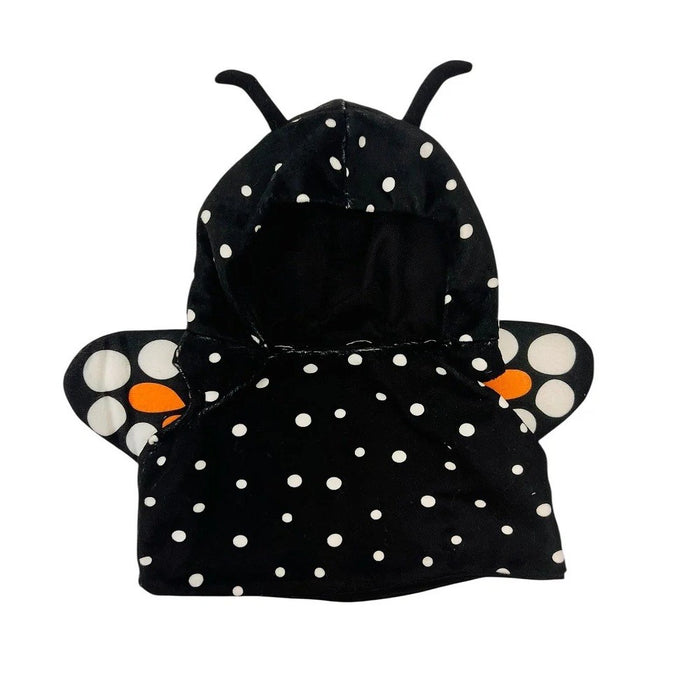 The Plushy's Closet Butterfly Costume is a black hooded outfit for kids with white polka dots, two antennae on the hood, and butterfly wings featuring white and orange spots attached to the back.