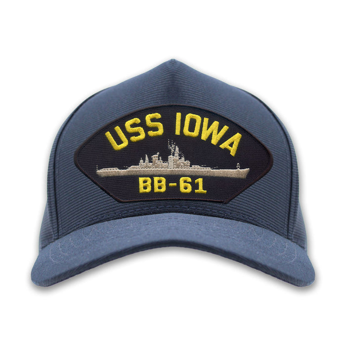 The USS IOWA BB-61 Embroidered Cap is a blue hat featuring a bold yellow patch with “USS IOWA BB-61” and a detailed embroidered image of the iconic battleship, making it the perfect accessory for naval history enthusiasts.