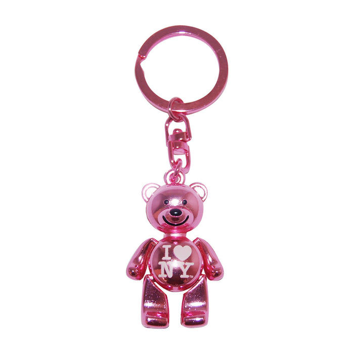 The I Love NY Pink Bear Keychain features a shiny pink bear with “I ♥ NY” on its chest, attached to a matching pink metal key ring—making it the perfect NYC souvenir.