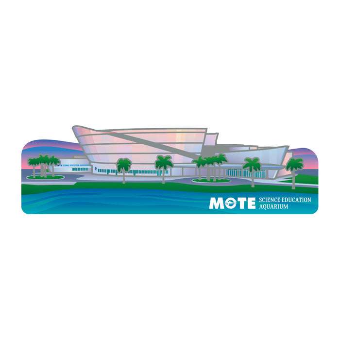 Sure! Here’s a rewritten version of your sentence using the product data: An illustration of the Mote Marine Laboratory Science Education Aquarium—with glass walls, palm trees, and shimmering water in the foreground beneath a vibrant sky—featured on the eye-catching Mote Marine Laboratory Iridescent Magnet, a tribute to marine conservation and Mote’s inspiring mission.