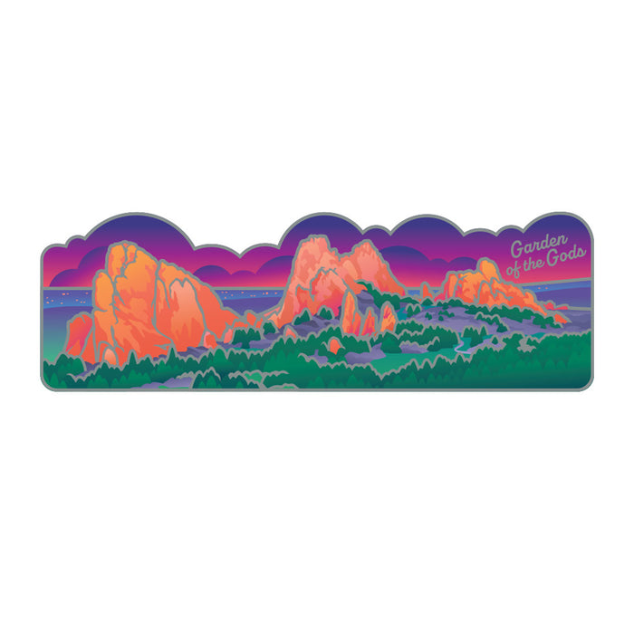 Showcasing the stunning red rock formations, lush green trees, and a vibrant sky in shades of purple, blue, and pink, this Garden of the Gods Iridescent Landscape Magnet features the text “Garden of the Gods” in the upper right corner—a unique collectible for fans of Colorado scenery or anyone looking to add a touch of Garden of the Gods beauty to their magnet collection.