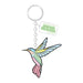 Desert Botanical Garden Hummingbird Superbloom Keychain featuring a hummingbird-shaped charm with a rectangular tag displaying a graphic.