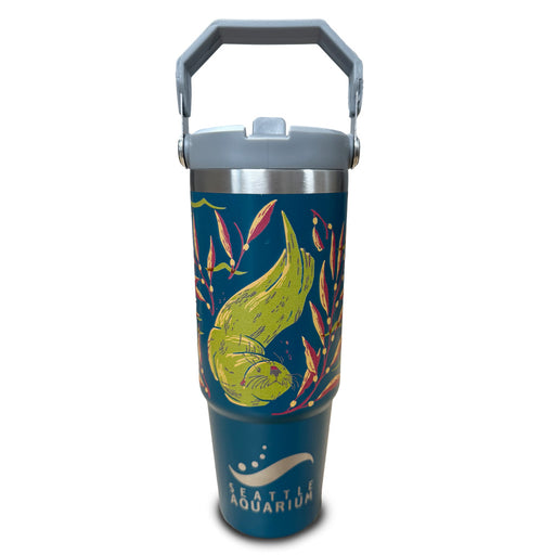 The Seattle Aquarium Sea Otter Water Bottle is blue with a gray handle and lid, features colorful seaweed and a green sea otter illustration, plus the Seattle Aquarium name and logo near the bottom, making it both fun and eco-friendly.