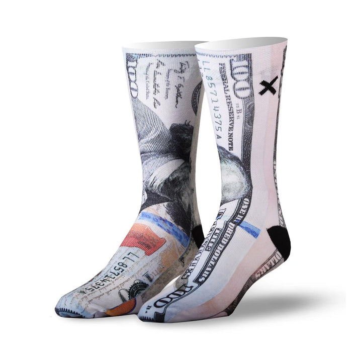 The 100 Dollar Bill Crew Socks showcase an eye-catching graphic print that mirrors the look of a hundred-dollar bill, complete with intricate currency details and stylish black accents on the heel and toe—making these luxury socks a bold fashion statement.