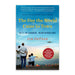 Book cover for The Day the World Came to Town Updated Edition: 9/11 in Gander, Newfoundland ― An Inspiring Social History of Stranded Passengers by Jim DeFede, inspired by the true events of 9/11 that later led to Come From Away, featuring a family of four standing before an airport runway lined with planes at Gander International Airport, as an airplane lands against a sunset blue sky.