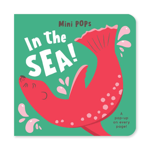 The cover of Mini Pops: In the Sea!: Mini Pop-Up Board Book features a playful red seal splashing on a green background. Ideal for toddlers, it promises "A pop-up on every page!" in the bottom right corner.