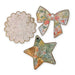Three watercolor ornaments in the shapes of a cat face, a bow, and a star, two featuring botanical patterns, included in this Paint your own Holiday Decorations set.