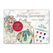 Paint your own Holiday Decorations craft kit with gold foil ornaments, a watercolor palette, and a paintbrush.