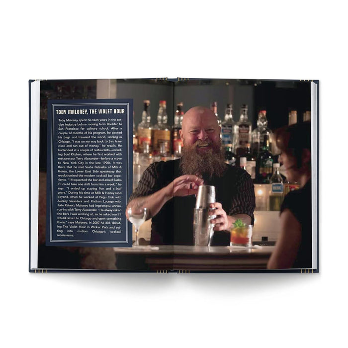 A bearded bartender smiles as he expertly shakes a cocktail shaker behind the bar, surrounded by bottles in the background. On the bar sits a garnished drink, while a woman engages with him across the counter. A text box on the left page highlights unique bartender stories and signature recipes featured in *Chicago Cocktails: An Elegant Collection of Over 100 Recipes Inspired by the Windy City (City Cocktails)*.