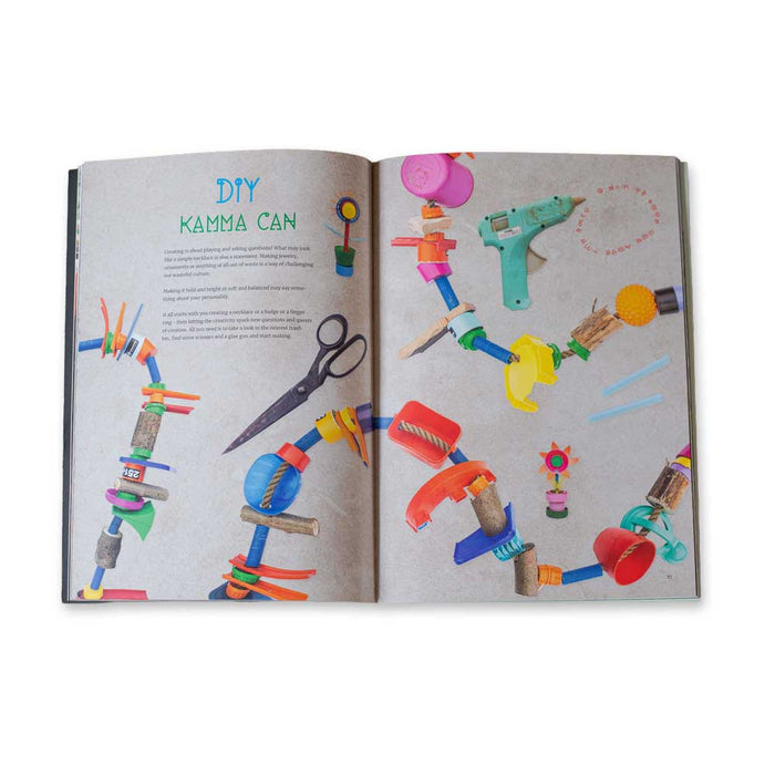 Open book from the Save The Humans – Catalogue showing a DIY Kamma Can project with instructions and photographs of necklaces made from recycled household objects, inspired by the style of Thomas Dambo trolls exhibition sculptures.