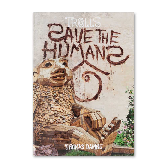 Save The Humans – Catalogue cover featuring a large wooden Thomas Dambo troll sculpture sitting in front of a wall with the words Trolls Save the Humans spray-painted in brown.