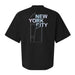 Edge NYC Pearlescent Logo Crew T-Shirt featuring an abstract line drawing of a building inspired by the New York skyline, with NEW YORK CITY displayed in pastel blue and pink letters stacked on the upper back.