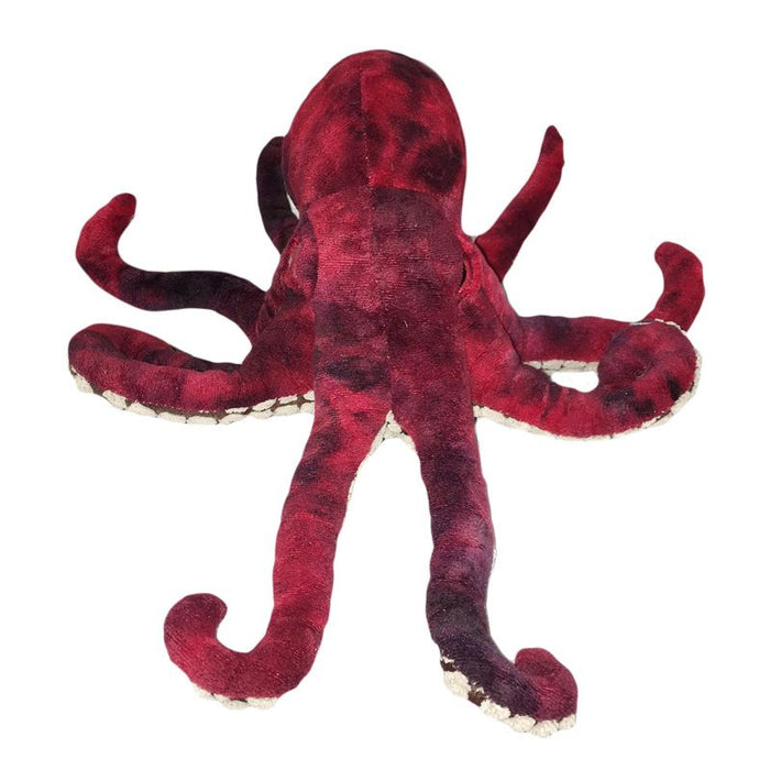 The Plush Pacific Octopus is a 12-inch stuffed toy in deep red and maroon, with eight curled arms and a textured surface, shown from the front.