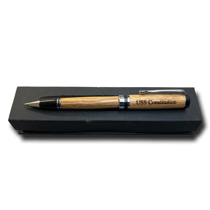 An Americana Pens and Pencils product featuring silver accents is displayed elegantly on a black box set against a white background.