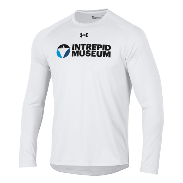 The Intrepid Museum Under Armour Tech Long Sleeve T-Shirt is white with the museum's logo and name in black and blue on the chest. It features UA Tech fabric for comfort.